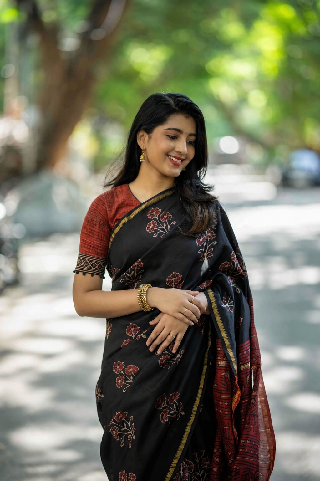 Tri Floral on Black Printed Cotton saree