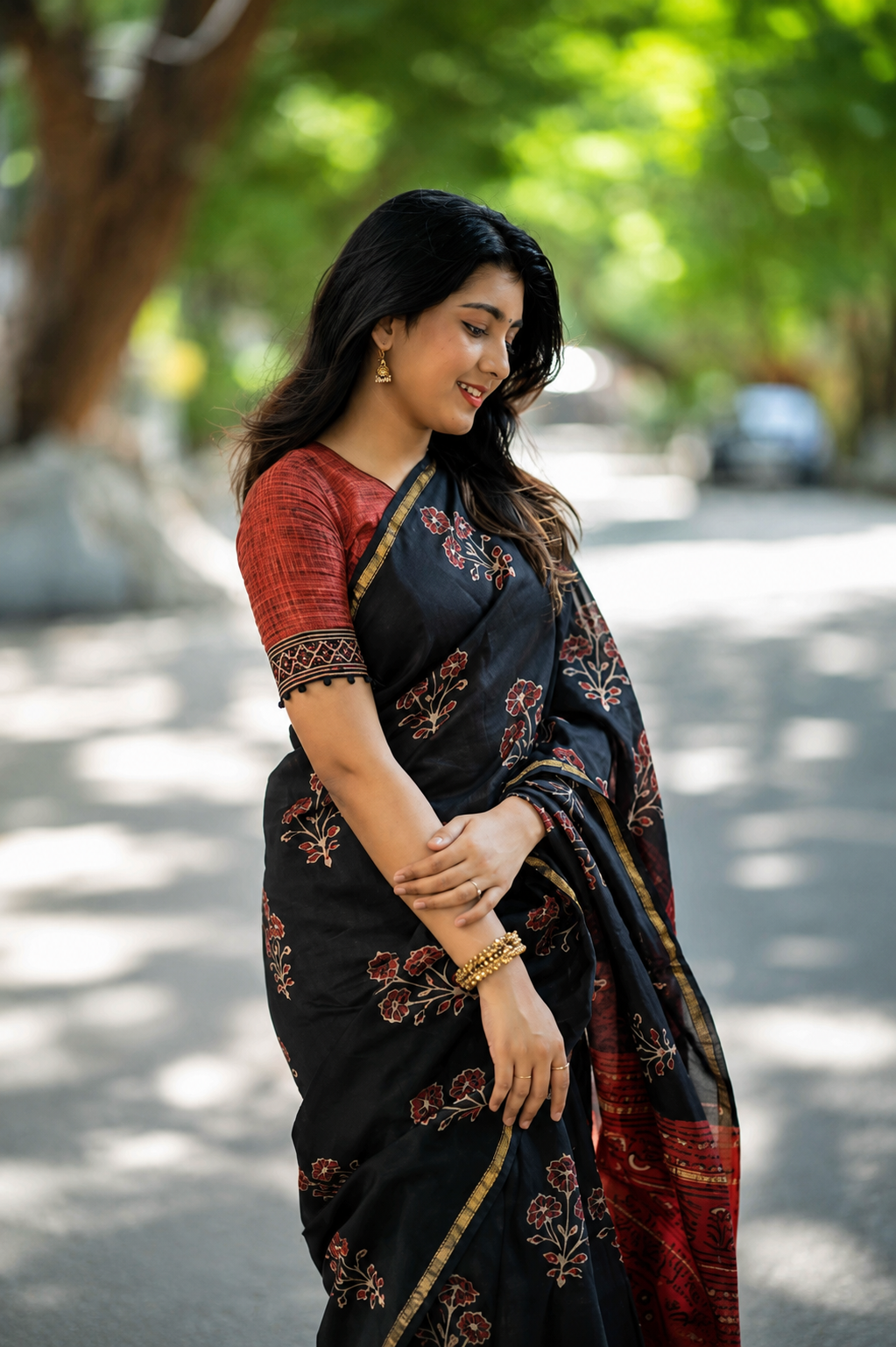 Tri Floral on Black Printed Cotton saree