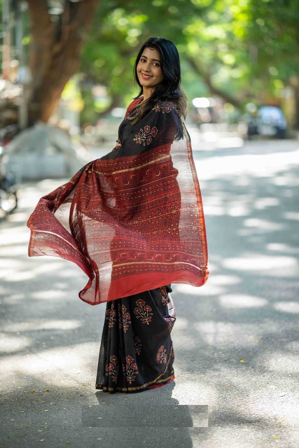 Tri Floral on Black Printed Cotton saree